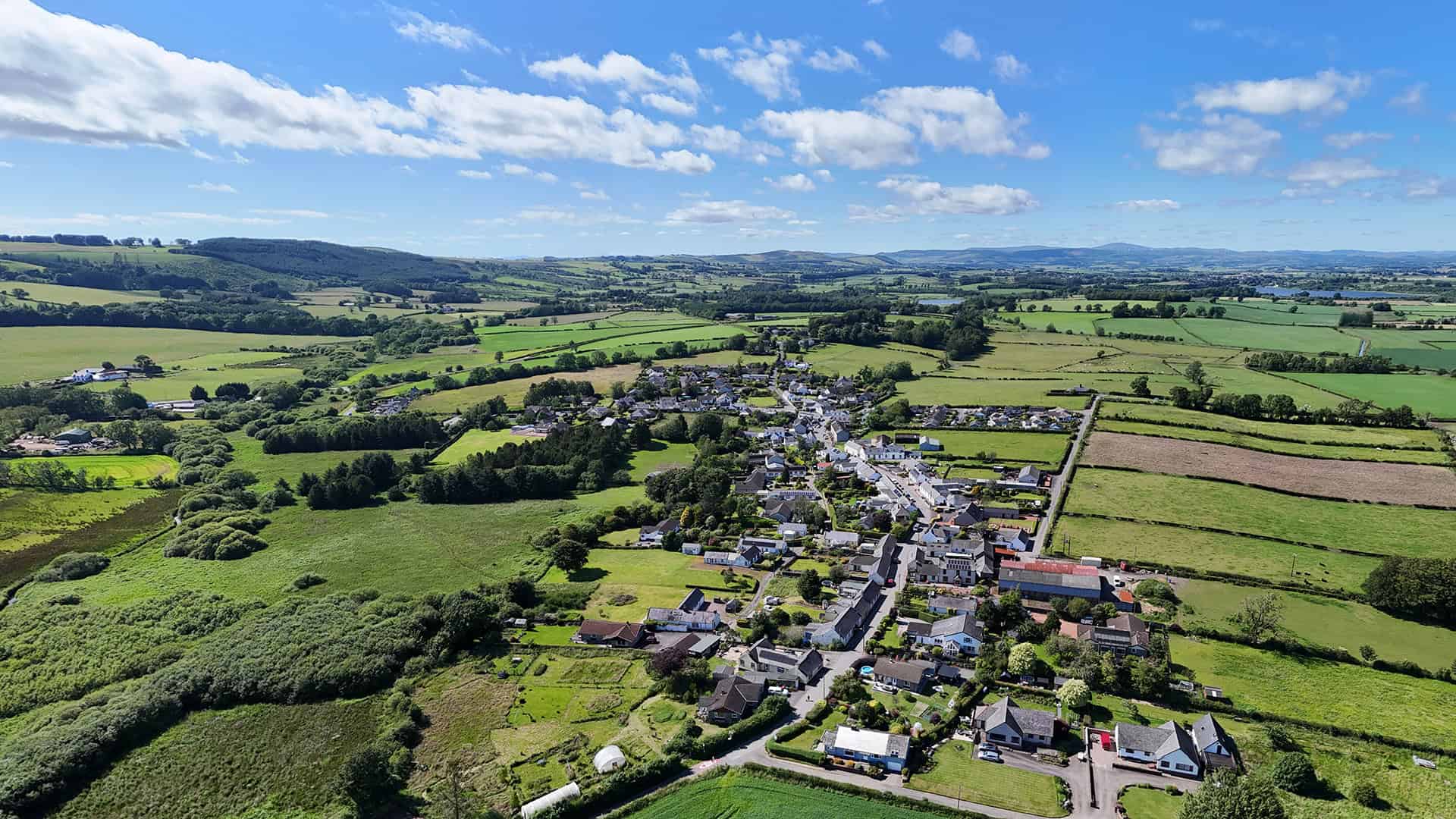 Aerial view of Hightae village and the surrounding Annandale countryside